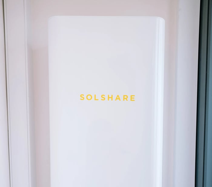 A world-first Allume SolShare hardware unit installed in a real-world setting to enable shared rooftop solar for multi-dwelling residents.