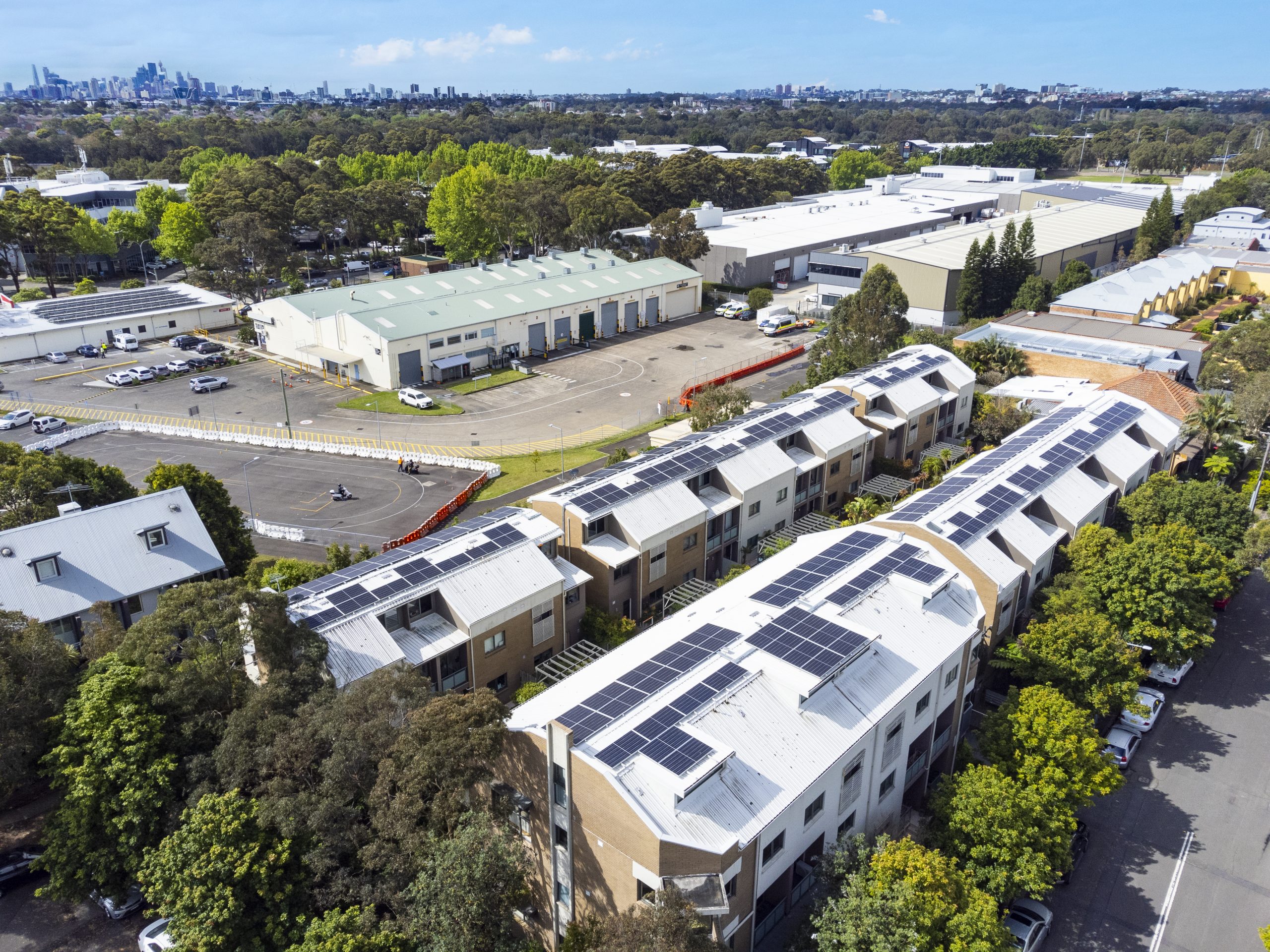 Allume Energy’s rooftop solar array on multifamily building.