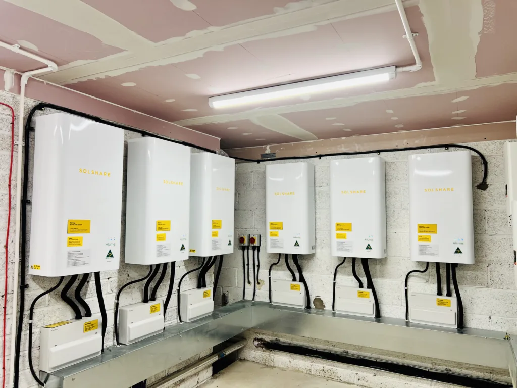 6 SolShares installed in a plant room on the roof of a 100 flat apartment building